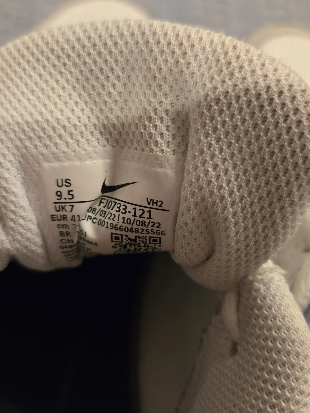 Nike Air Lightweight White Sneakers with Black Swoosh